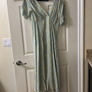 Beautiful floral French connection dress with side slit. US size 6. Never worn